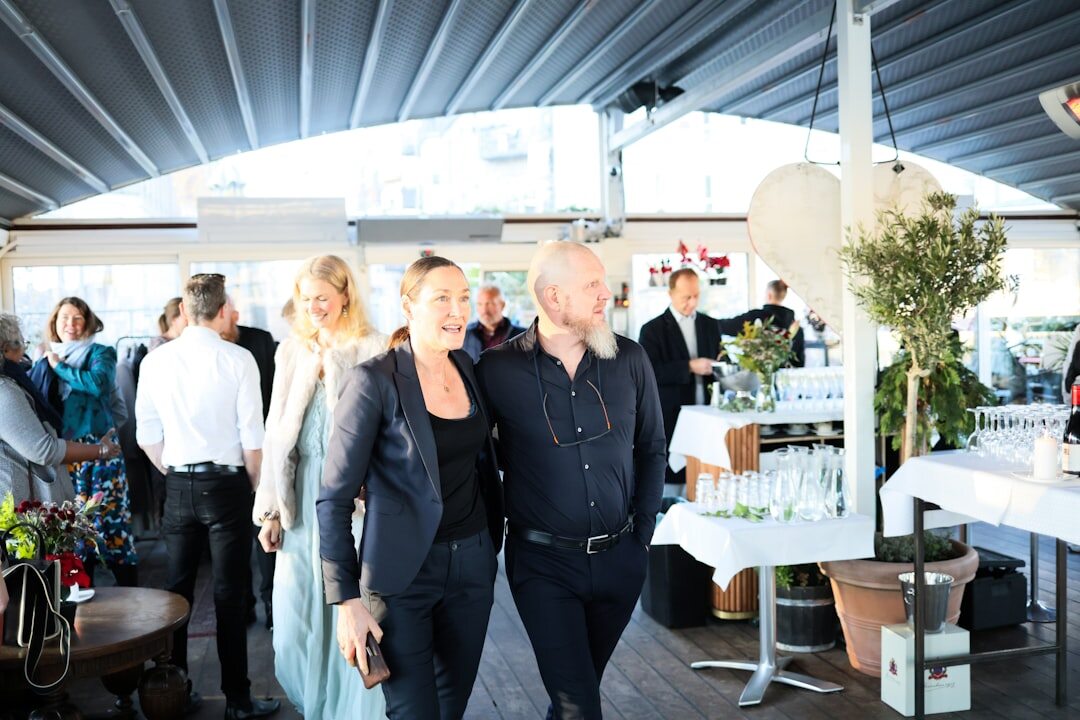 Business networking event with professionals talking in Aarhus